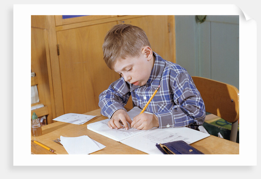 Boy Working on His Schoolwork by Anonymous