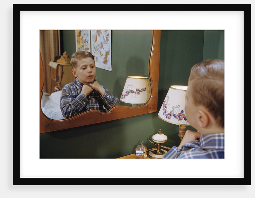 Boy Getting Dressed by Anonymous