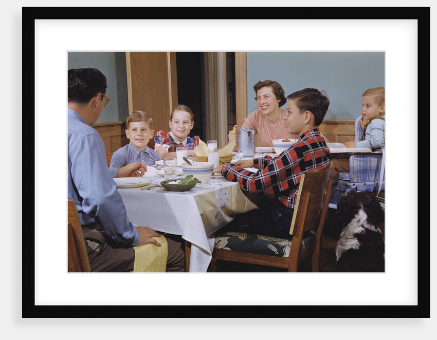 Family Eating at the Dinner Table by Anonymous