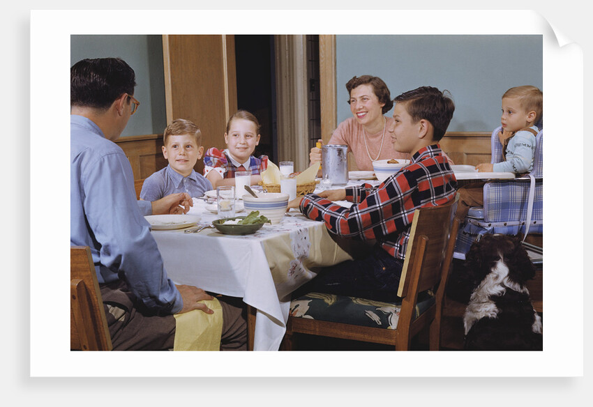 Family Eating at the Dinner Table by Anonymous