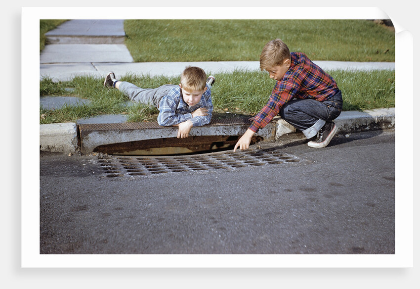 Boys Looking into Grate by Anonymous