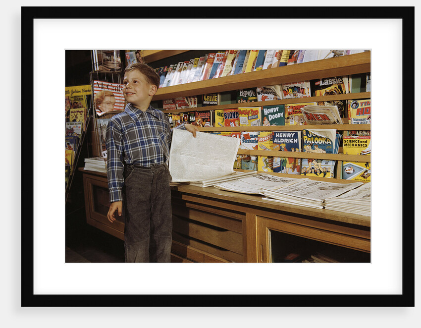 Boy Holding Paper in Newsstand by Anonymous