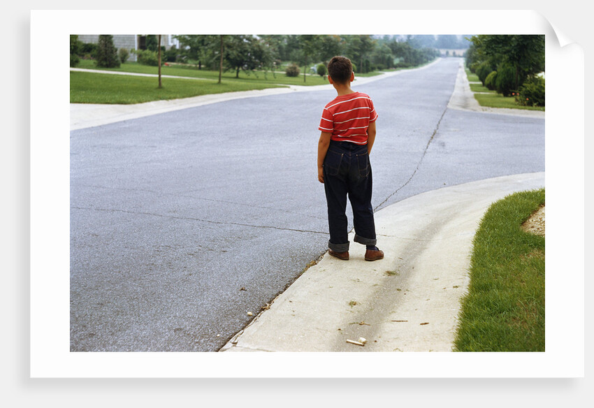 Boy Waiting on Suburban Street by Anonymous
