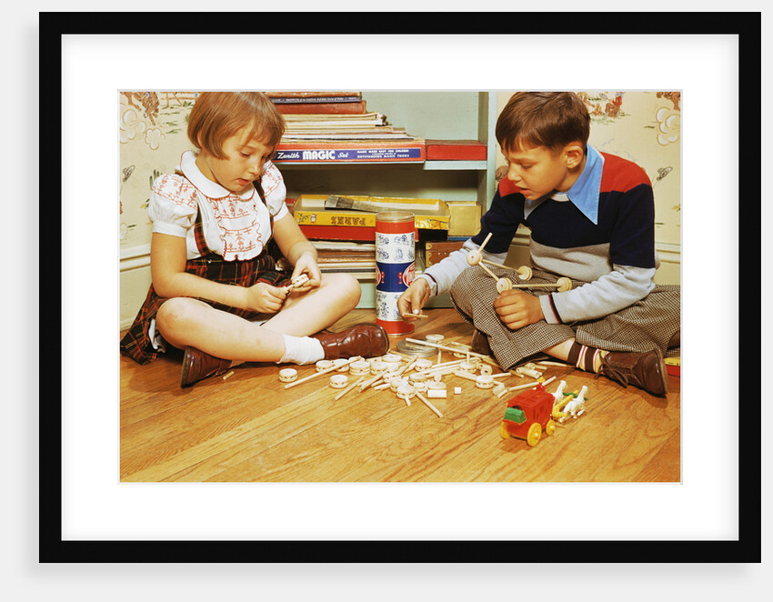 Boy and Girl Playing with Tinkertoys by Anonymous