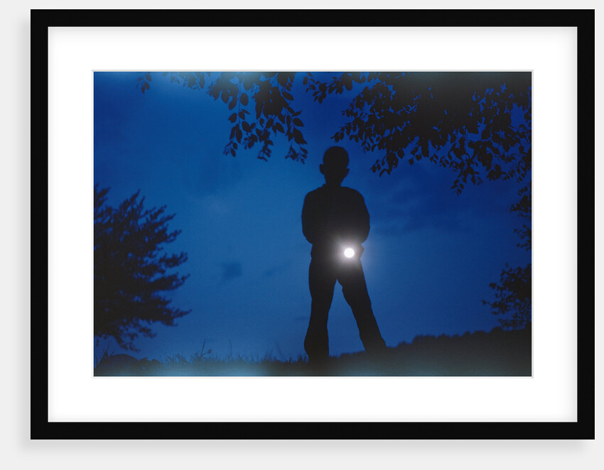 Silhouette of Boy Holding Flashlight by Anonymous