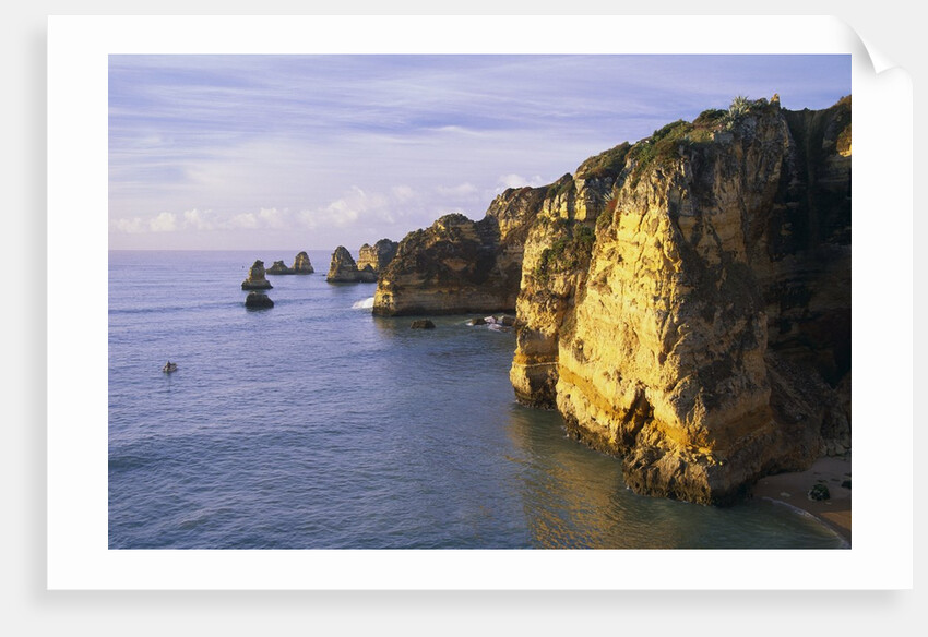 Sanstone Cliffs at Praia de Dona Ana Beach in Portugal by Anonymous
