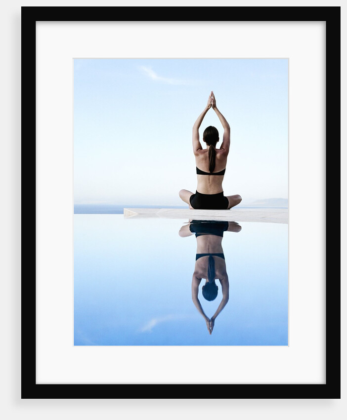 Woman Exercising on Swimming Pool Edge by Anonymous