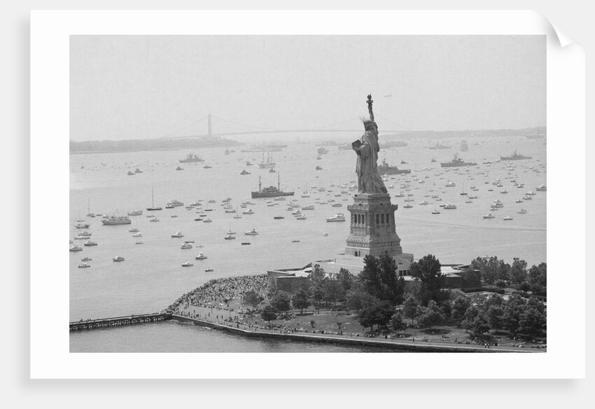 Long Line Of Ships Sails Past Statue by Anonymous
