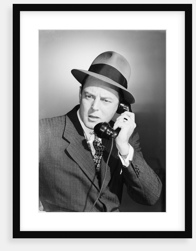 Man Using Telephone by Anonymous