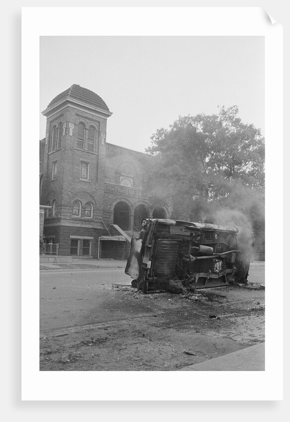 Bombed Car in Front of Church by Anonymous