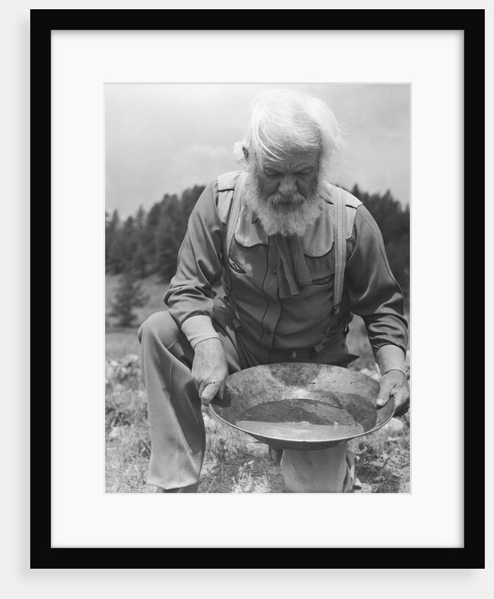 Old-Time Gold Prospector with Pan in Hands by Anonymous