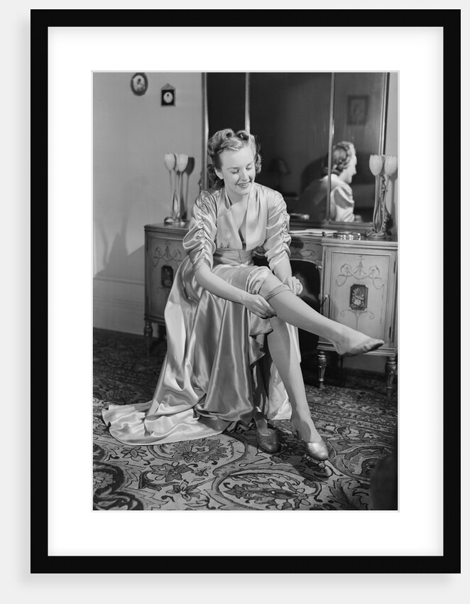 Woman Putting On Stockings by Anonymous