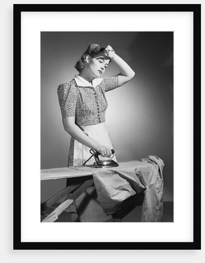 Woman Hard at Work Ironing by Anonymous