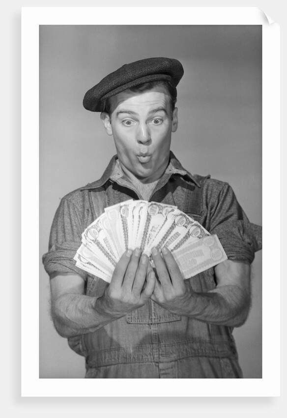 Man Holding Fan of Money by Anonymous
