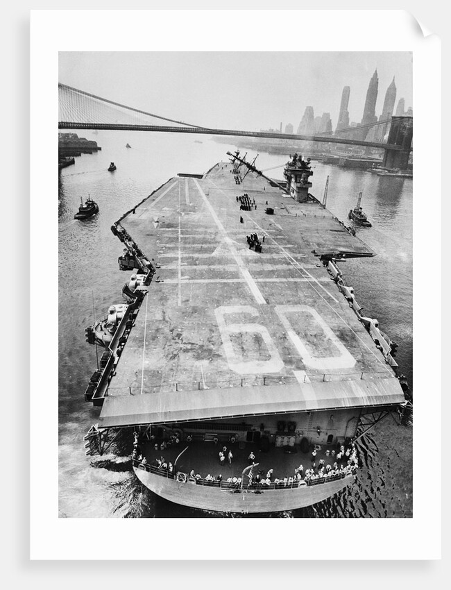 Huge Supercarrier Sailing Under Bridge by Anonymous