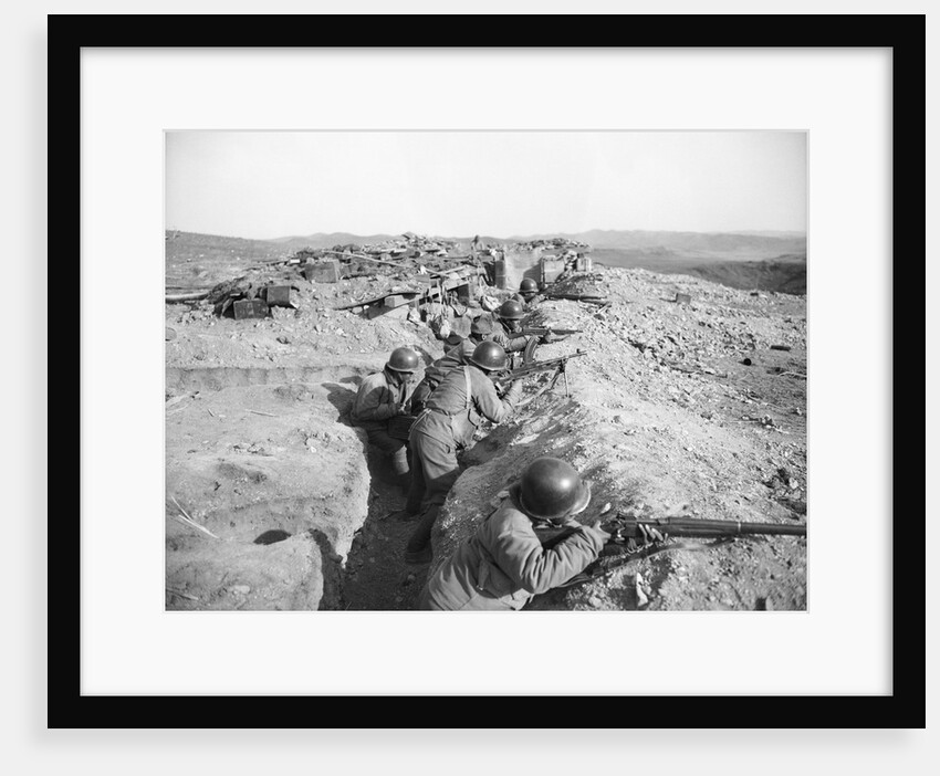 Soldiers In Trenches Firing Rifles by Anonymous