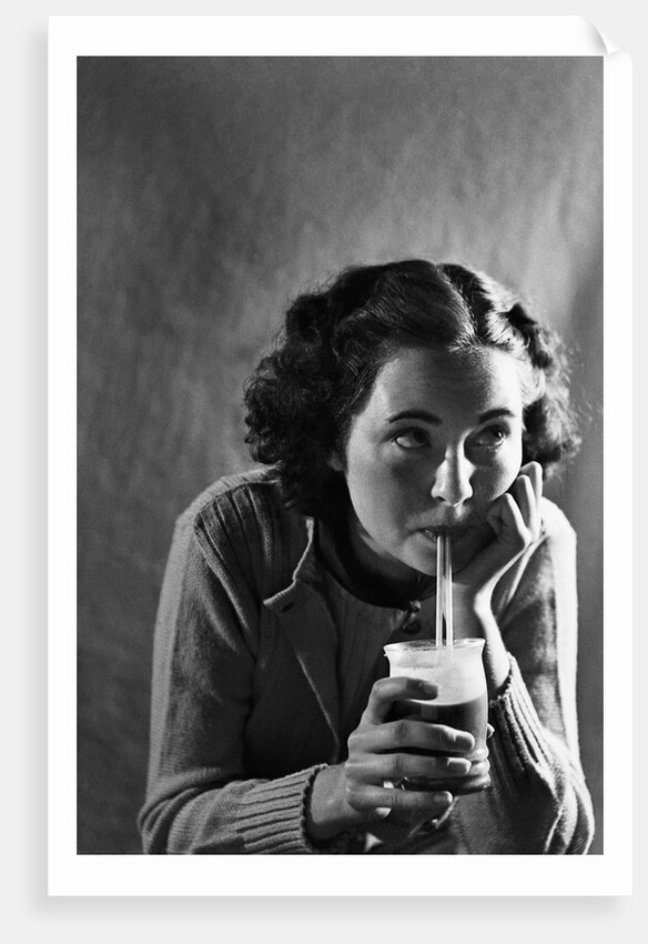 Girl Sipping a Soda by Anonymous