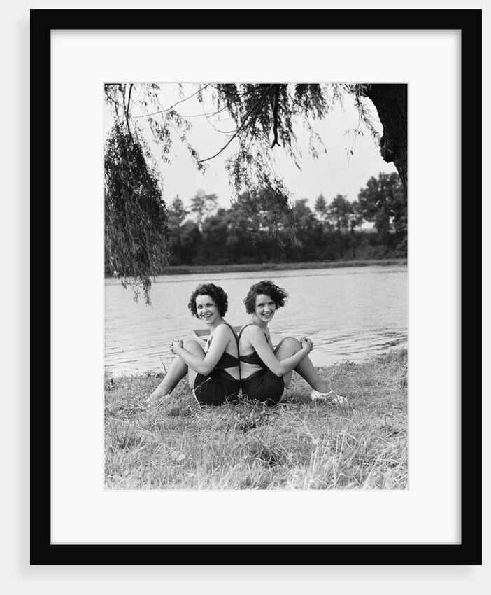 Twin Sisters Sitting Back to Back by Anonymous