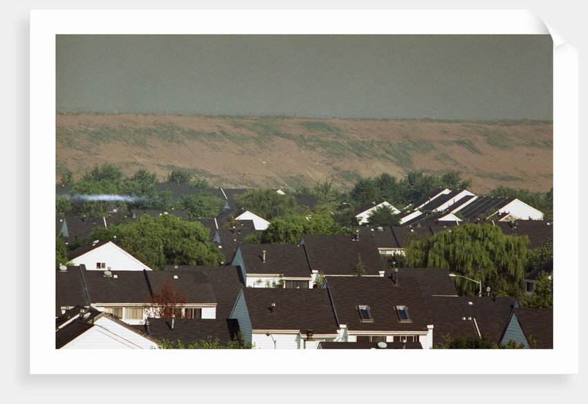 View Of Landfill Over Housing Developmen by Anonymous