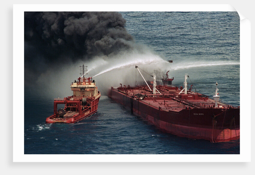 Boat Pours Water On Burning Oil Tanker by Anonymous
