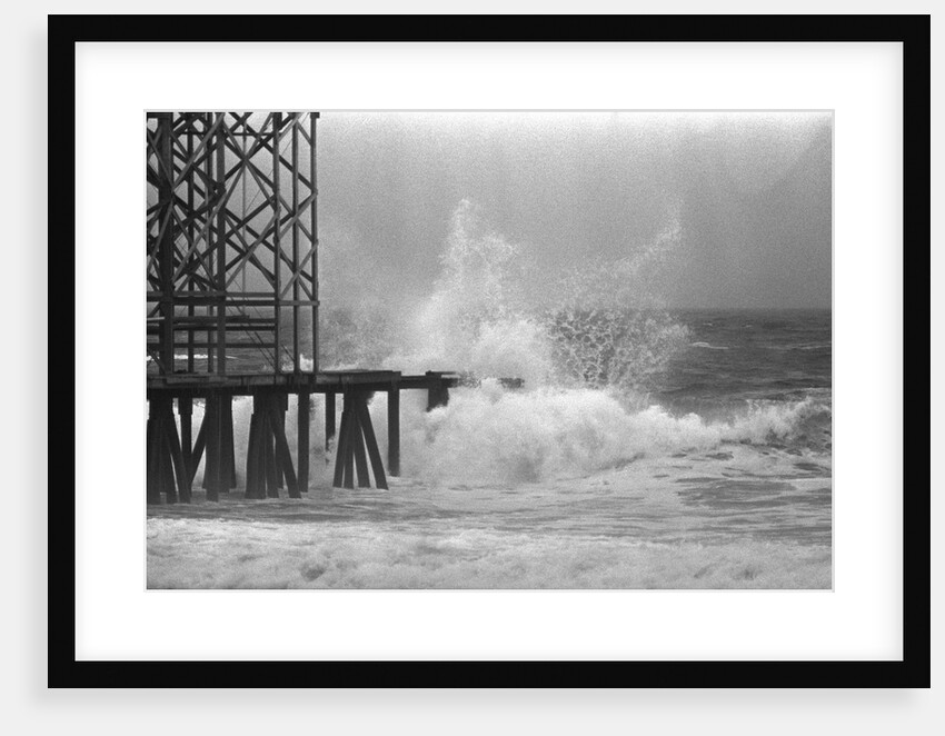 High Waves Crash On Boardwalk Pier by Anonymous