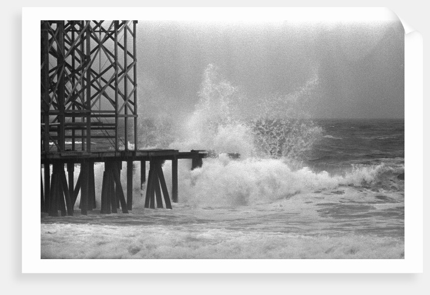 High Waves Crash On Boardwalk Pier by Anonymous