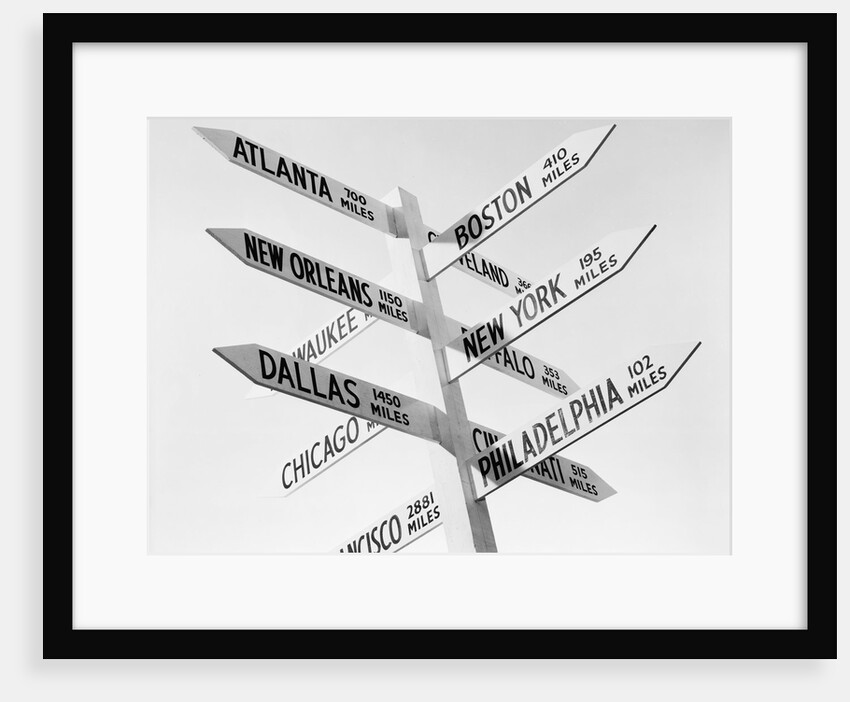 Sign Post W/Distances To Major Cities by Anonymous