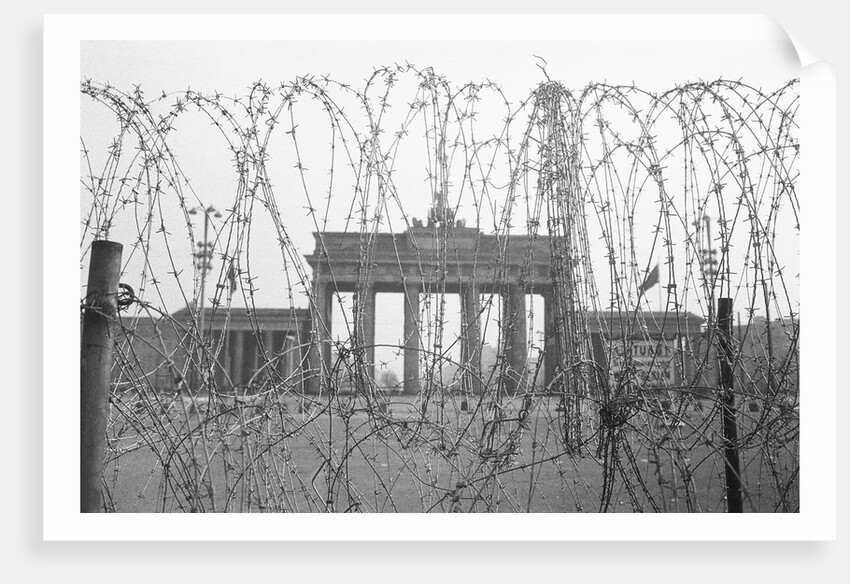 Barbed Wire and Brandenburg Gate by Corbis