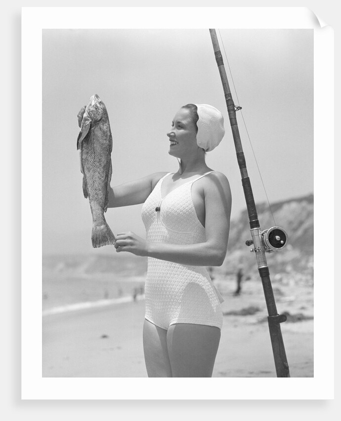 Female Fisherman Showing Her Catch by Anonymous