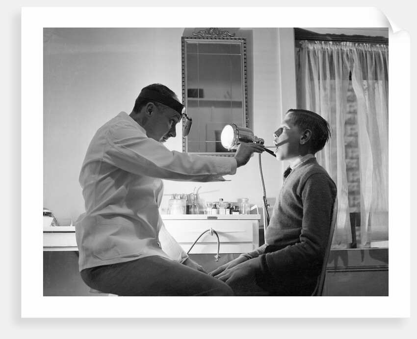 Doctor Examining Boy Patient by Anonymous