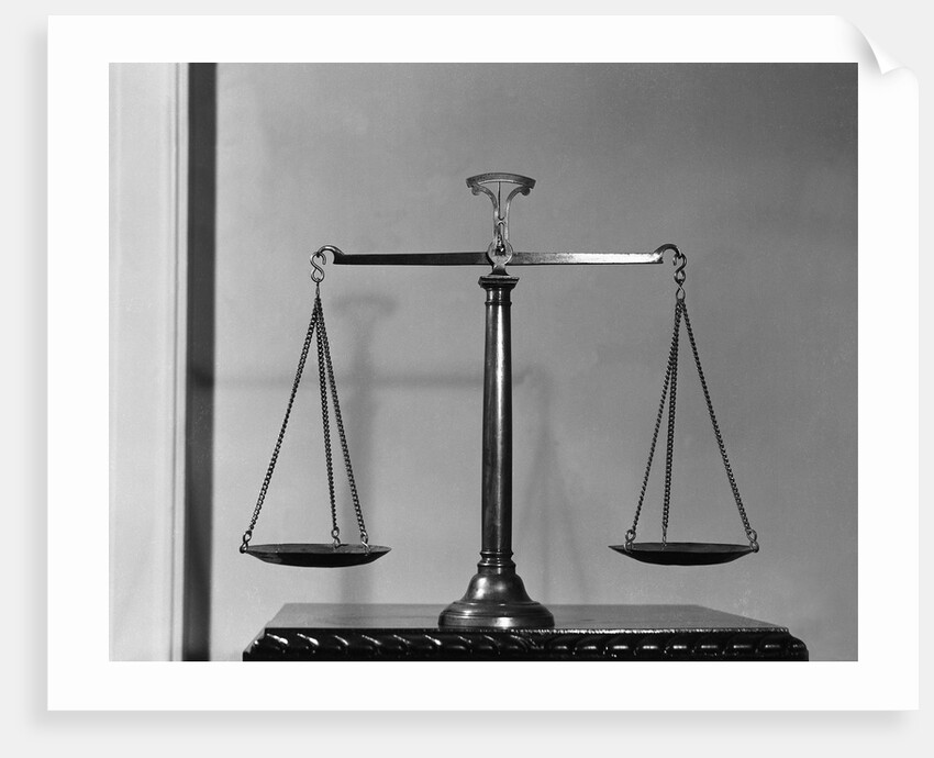Balancing Scales On Table by Anonymous