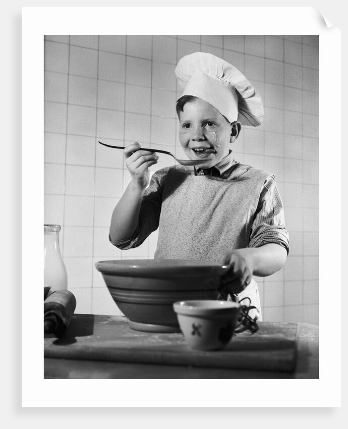 Boy Tasting His Cooking by Anonymous