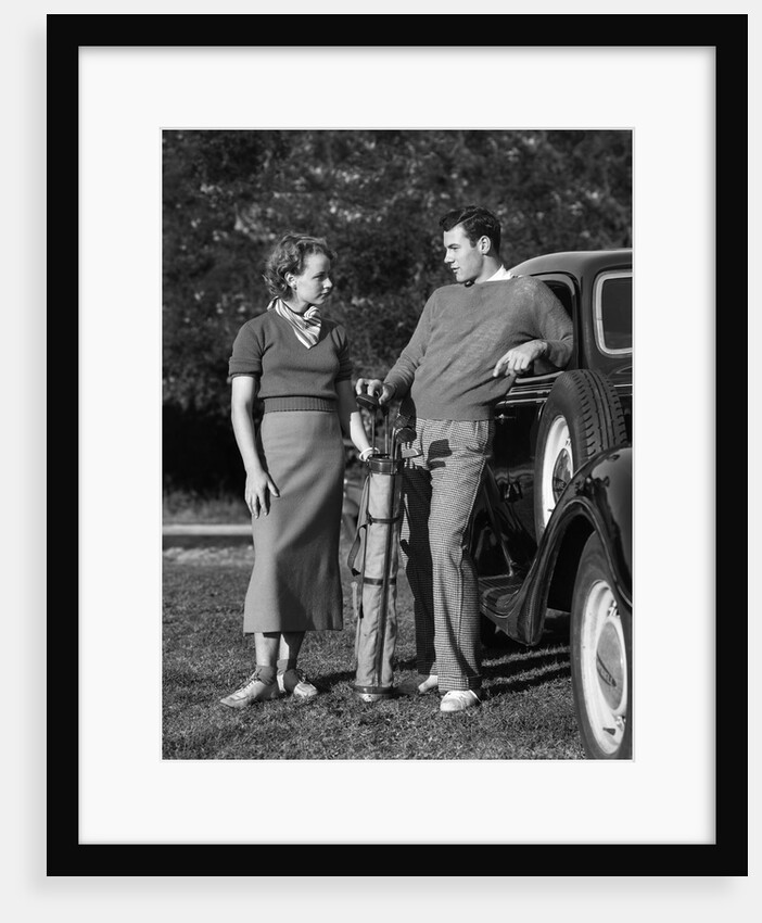 Couple Taking a Break from Tennis by Anonymous