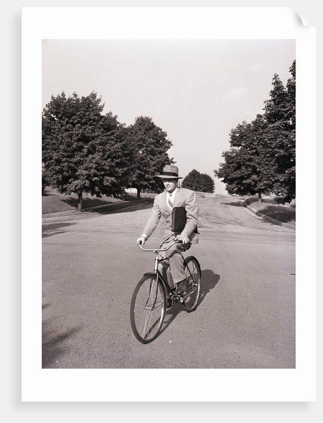 Businessman Riding a Bicycle by Anonymous