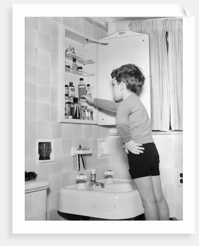 Boy Reaching into Medicine Cabinet by Anonymous