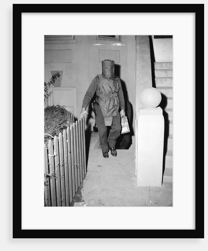 Policeman in Protective Gear Carries Bombs by Anonymous