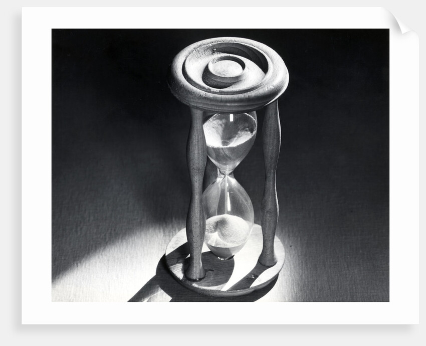 Sand Running Through Hourglass by Anonymous