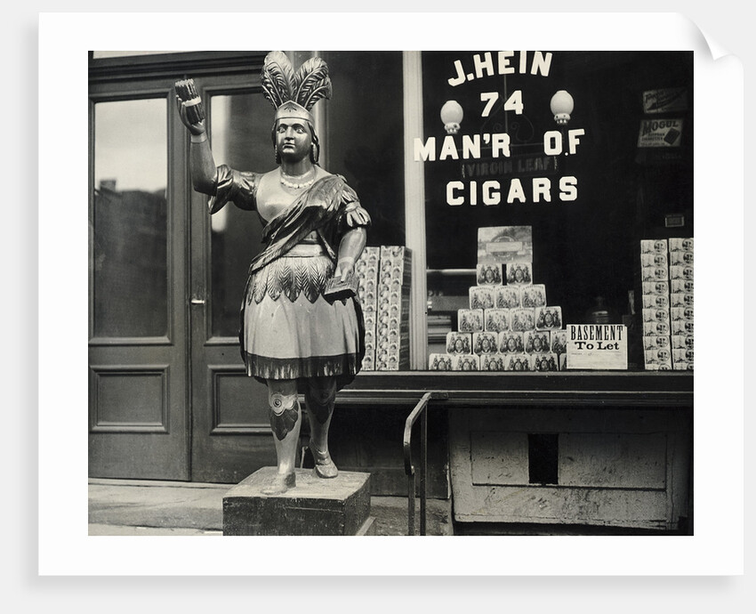 Wooden Statue In Front Of Cigar Shop by Anonymous
