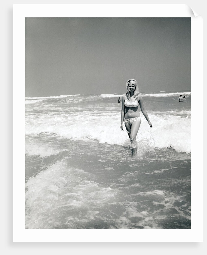 Woman Walks Out Of Ocean Surf by Anonymous