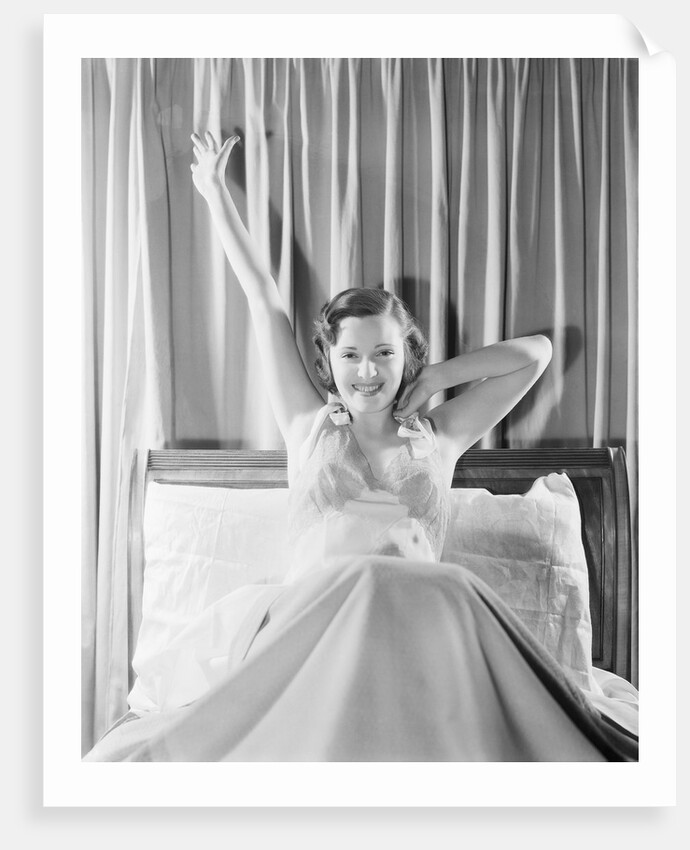 Woman Stretching in Bed by Anonymous