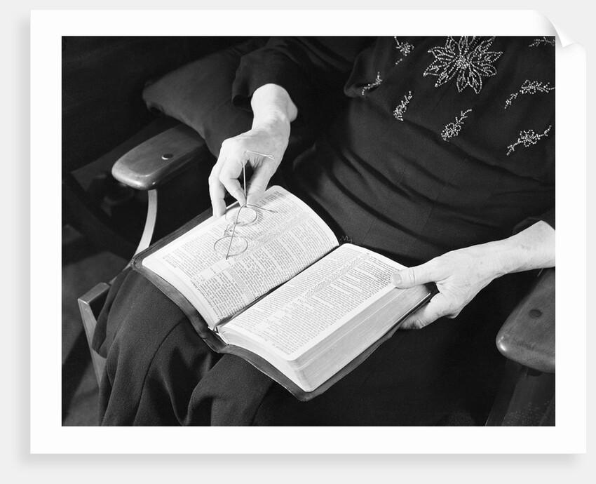 Bible in Woman's Lap by Anonymous