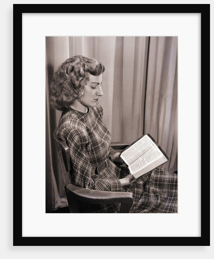 Seated Woman Reading Bible by Anonymous