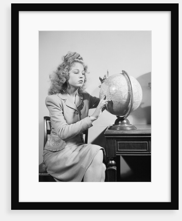 Seated Woman Spinning Globe by Anonymous