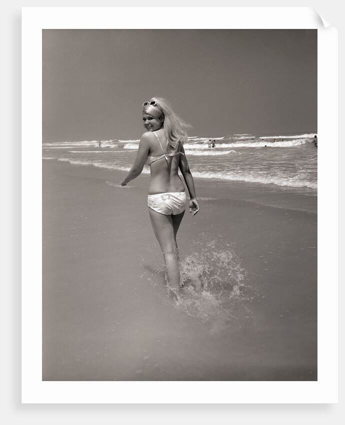 Beachgoer Looking over Her Shoulder by Anonymous