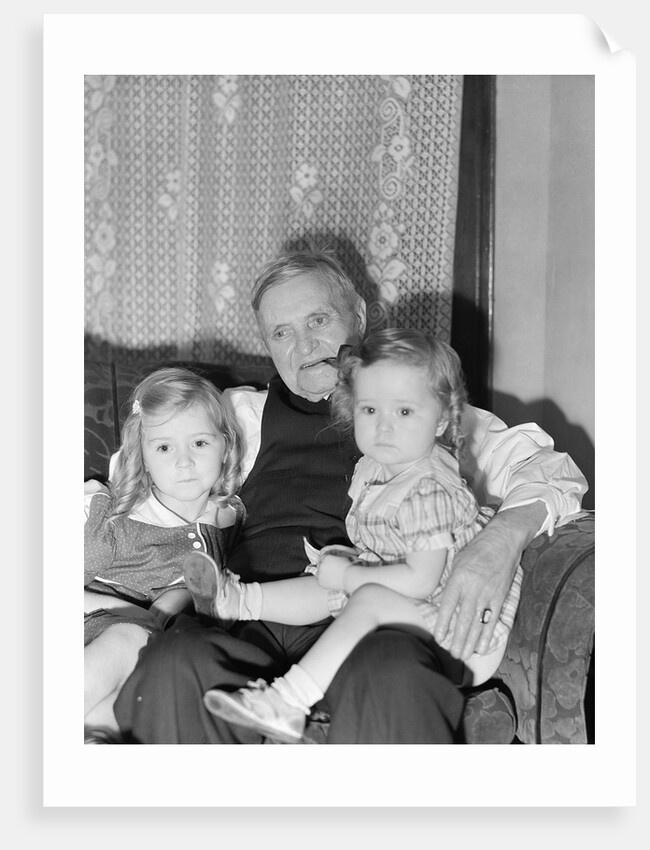 Two Girls on Grandfather's Lap by Anonymous