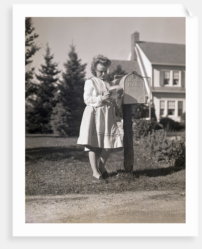 Woman Reading Mail by Mail Box by Anonymous