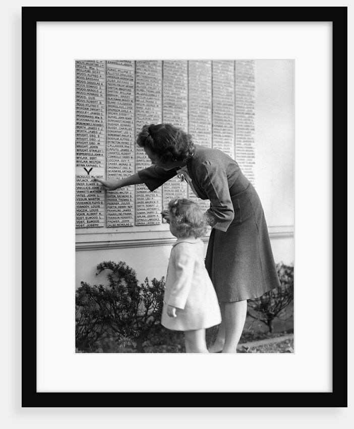 Woman And Daughter At Honor Roll Wall by Anonymous