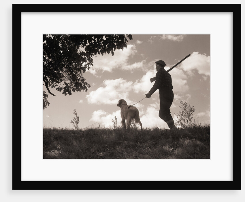 Hunter Walking with Bird Dog by Anonymous