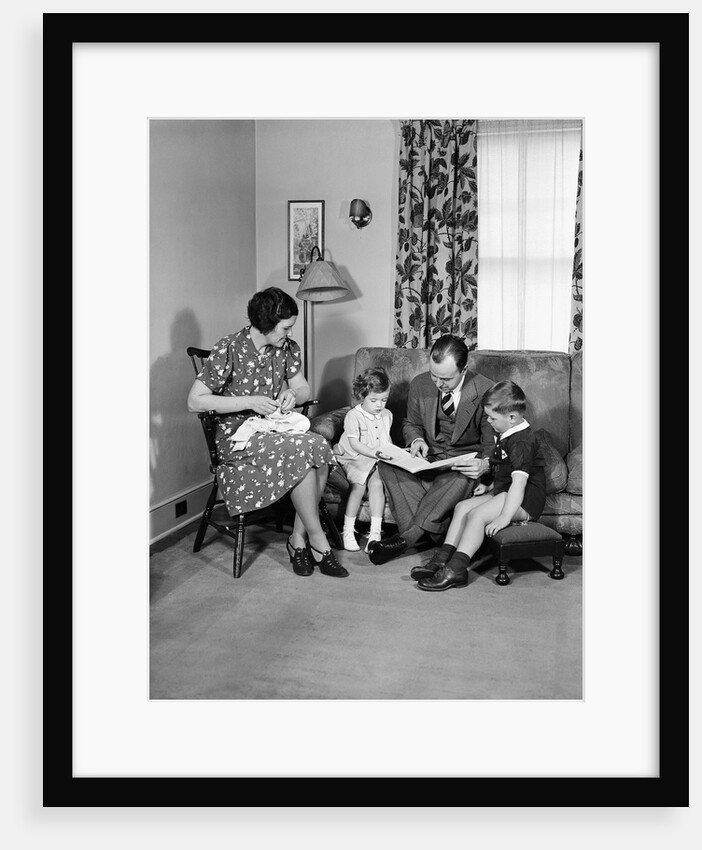 Family Sitting in Living Room by Anonymous