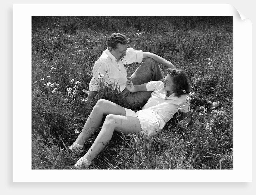 Couple Lying in Field by Anonymous
